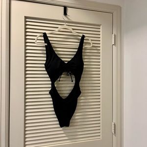 PINK cutout one piece swim suit size S in black